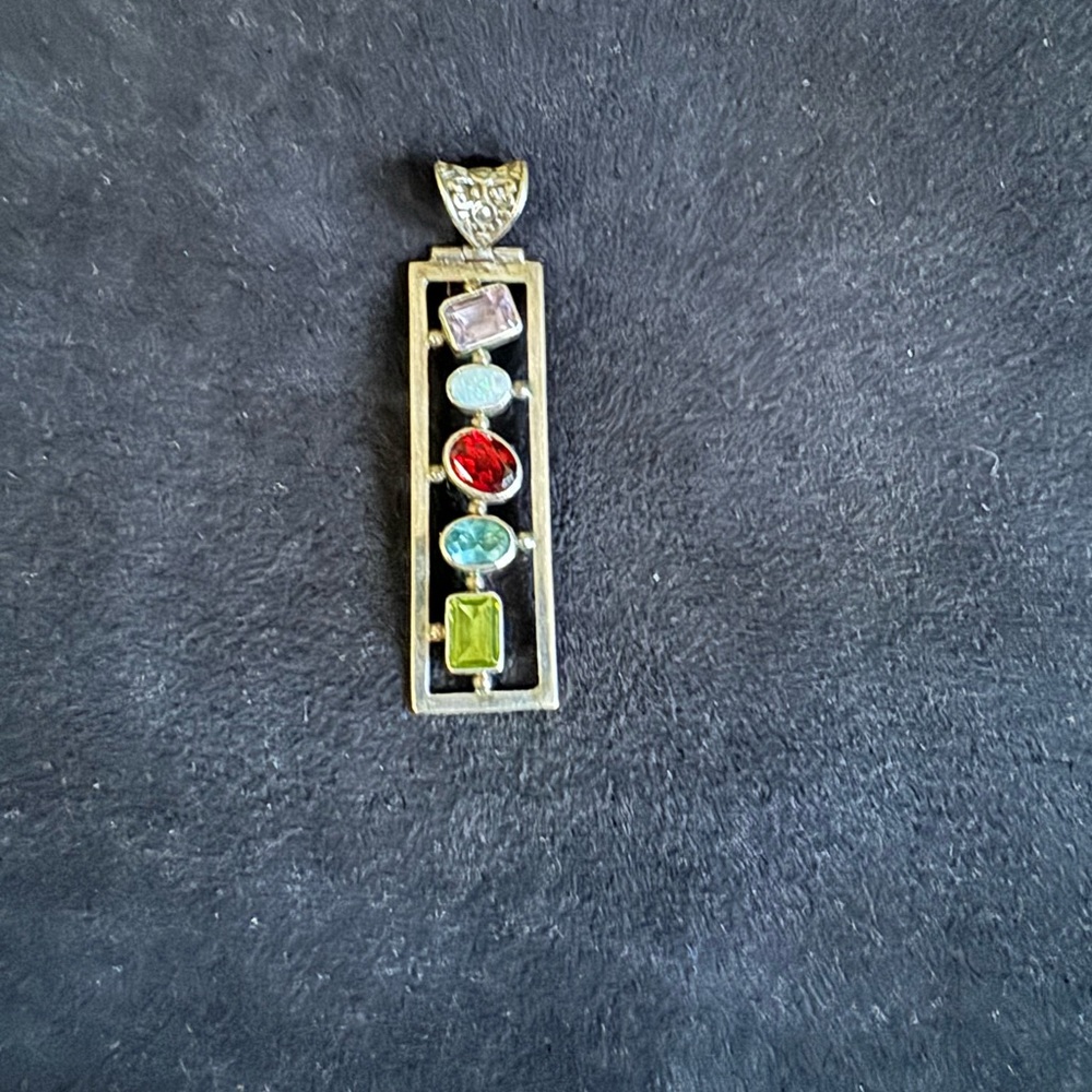 Sterling silver pendant with gemstones
